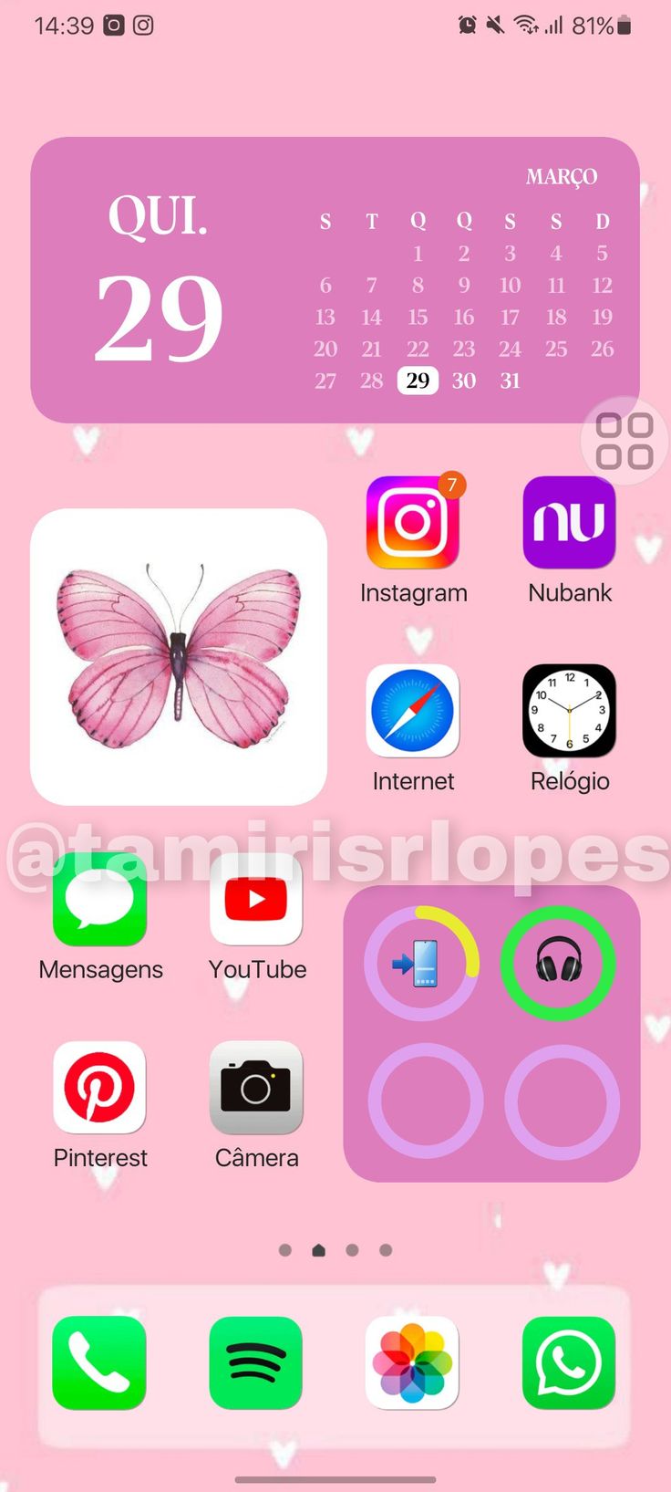 a pink phone with icons on the screen