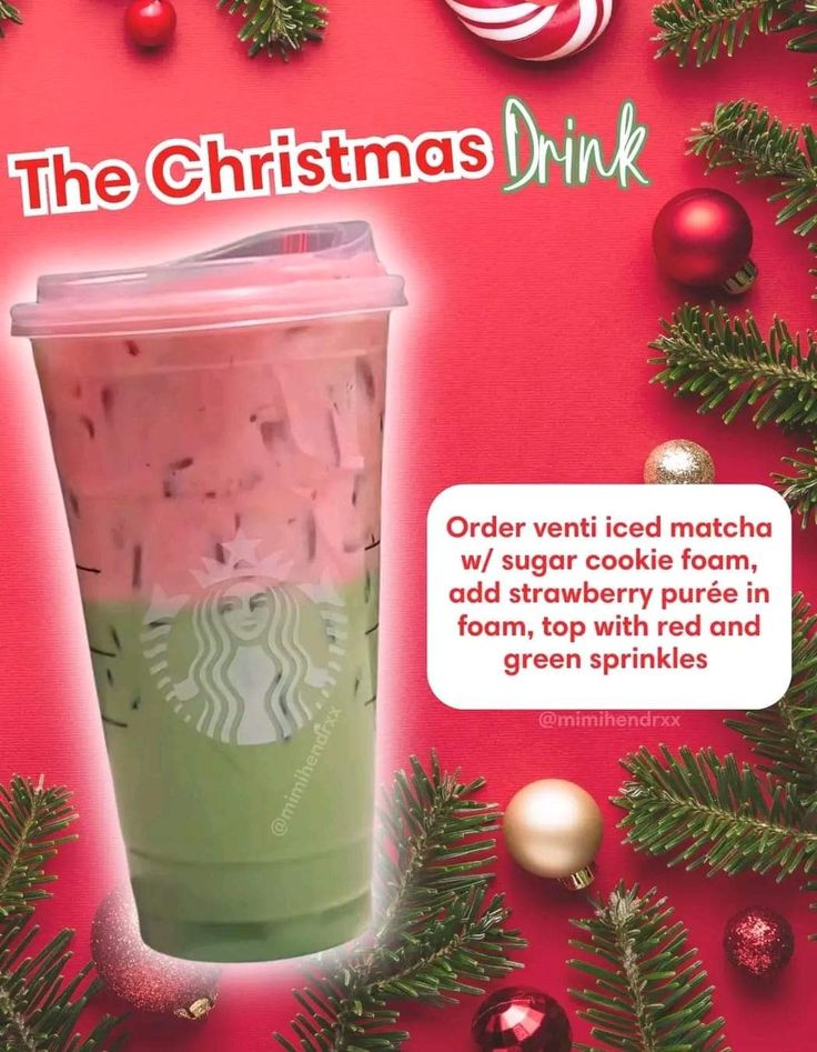 the christmas drink is on display with ornaments around it