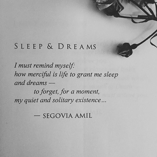 a poem written in black and white on paper with flowers laying next to it that reads, sleep & dreams i must remind myself how merciful is life to grant me