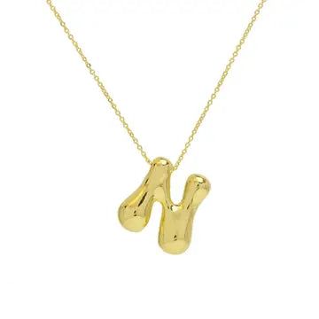 Dare to make a splash with our Waterdrop Initial Necklace! Crafted from 18K gold and beautifully filed, this necklace is perfect for those looking to add a luxurious touch to their outfit. With its unique waterdrop shape, this necklace is guaranteed to add excitement and adventure to your style. So go ahead, take the plunge and make a statement! Initial size is 0.75” 18” chain length with 2” extension Gift Clavicle Chain Necklace With Drop Shape, Drop Necklace With Clavicle Chain As Gift, Gold Drop Necklace With Adjustable Chain, Gold Necklace With Adjustable Chain And Drop Shape, Modern Yellow Gold Drop Necklaces, Modern Gold Drop Necklace As Gift, Modern Gold Drop Necklace For Gift, Modern Gold Drop Necklace Perfect For Gifts, Tarnish Resistant Yellow Gold Drop Necklace