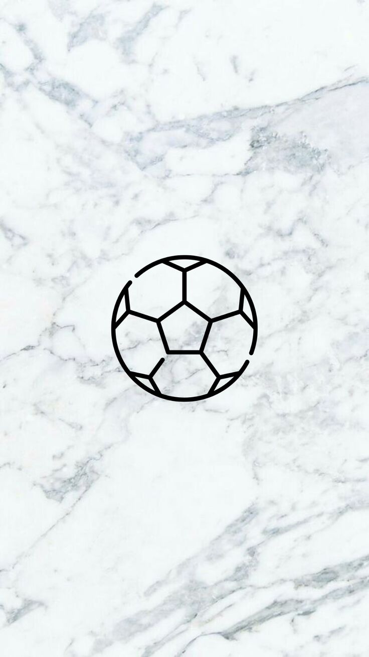 a soccer ball drawn on top of a white marble surface with black lines in the middle