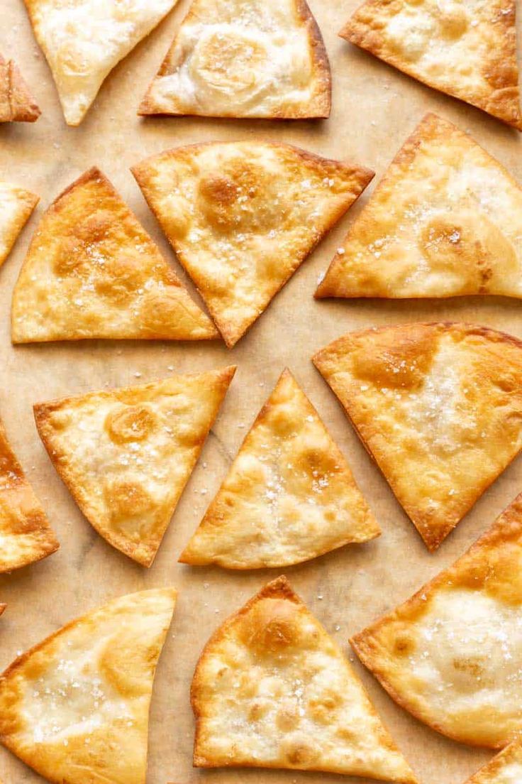 several pieces of pizza sitting on top of a pan