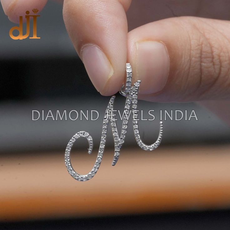 Handmade Pave Set Diamond 14k Solid White Gold Initial M Alphabet Charm Pendant Jewelry PEMJ-1803 🇮🇳 MADE IN INDIA 🇮🇳 Birthstone Month: ♦ April. Material: ♦ 14k White Gold. ♦ Natural Diamond. ♦ 23x21 MM Pendant Size.  Purpose: ♦ Pendant For Gifts. ♦ Christmas / Anniversary / Birthday / Bridesmaid / Valentine Gift. ♦ Gift For Love / Wife / MOM / BFF / Girl Friend. 💫Here Are Some Amazing Ways To Take Care Of Your Precious Diamond Jewelry. ♦ Always. ✔ Apply lotion, cosmetics, hairspray, and perfume before dressing in jewelry. ✔ When undressing, wipe each piece with a clean soft cloth to remove oils and perspiration. ✔ Store in a fabric-lined box, separately or individually-wrapped in tissue to prevent scratches. ♦ Care: ✖ Never wear jewelry when doing physical work such as housekeeping, Wedding Jewelry With Initials In Cubic Zirconia, Dazzling 14k Gold Hallmarked Jewelry, Silver Initial Pendant With Diamond Cut, Diamond White Sterling Silver Initial Pendant Jewelry, White Diamond Personalized Jewelry, Diamond White Sterling Silver Jewelry With Initial Pendant, Sterling Silver Jewelry In Diamond White With Initials, White Diamond Jewelry With Initials, 14k Gold Silver Jewelry With Brilliant Cut