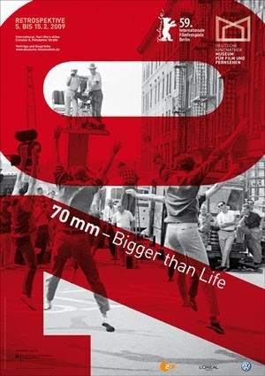 a poster with people playing basketball on the street and in the background is a large red letter