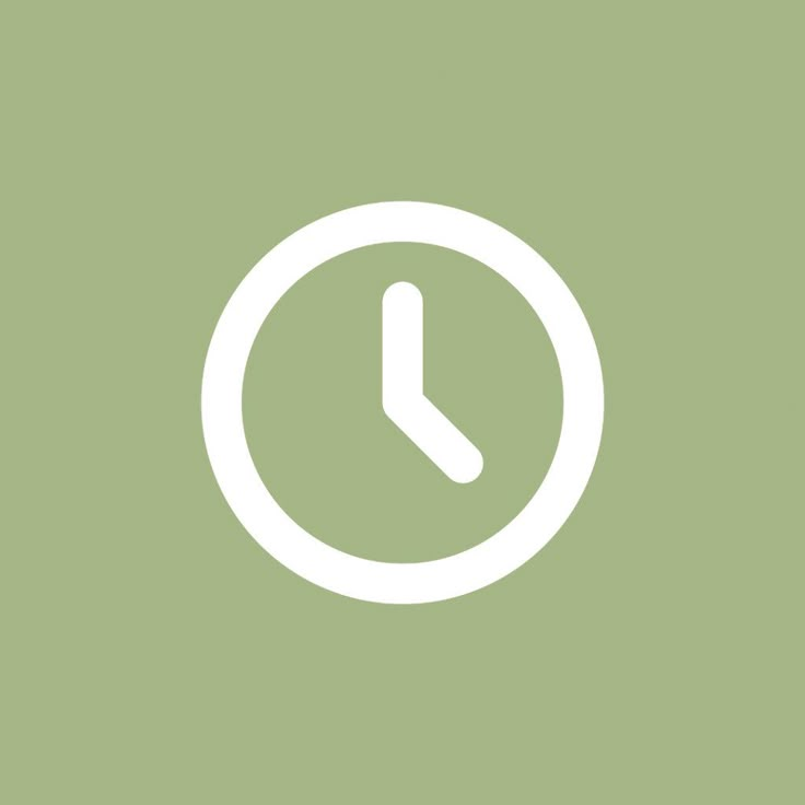 a clock icon on a green background