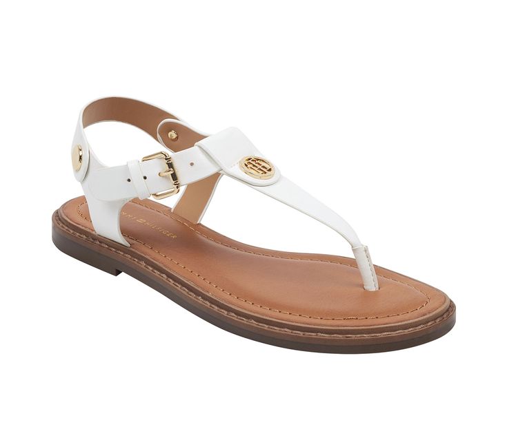 Smooth synthetic upper,Adjustable buckle closure for a custom and secure fit,Classic rounded open toe,Cushioned foam footbed for added comfort,Durable synthetic outsole,Tommy Hilfiger® branding details | Women's Tommy Hilfiger Bennia Sandals in White Size 5 Medium T Strap Flats, Shoe Carnival, Womens Sandals Flat, Tommy Hilfiger Women, Thong Sandals, T Strap, Back Strap, Flip Flop Sandals, Flat Sandals