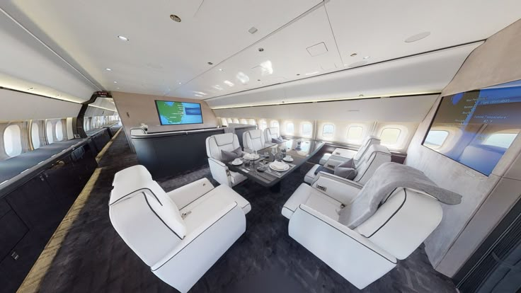 the inside of an airplane with white furniture