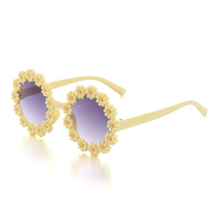 Adorable Daisy Flower Sunglasses for Your Little Sunshine Brighten up your child's day with our Kids Round Daisy Flower Sunglasses! Designed for outdoor sun protection, these charming and whimsical shades add a dash of retro flair to any outfit. The round frames, decorated with cute daisy petals, come in six cheerful colors, perfect for any little girl's sunny adventures. Whether it's a family outing, beach day, or festival party, these sunglasses will help your child step out in style while keeping their delicate eyes safe from harmful UV rays. Outstanding Features of Kids Daisy Sunglasses Retro Fashion: Cute round daisy flower frames capture the playful spirit of the past while adding a modern, fun twist. Six Vibrant Colors: Choose from a range of colorful frames to match your child's pe Adjustable Retro Sunglasses For The Beach, Pink Round Frame Sunglasses For Spring, Retro Adjustable Sunglasses For Summer, Adjustable Round Frame Sunglasses For Beach, Yellow Plastic Sunglasses For Summer, Spring Beach Sunglasses, Whimsical Sunglasses With Uv Protection For Beach, Yellow Summer Sunglasses With Uv Protection, Whimsical Beach Sunglasses With Uv Protection