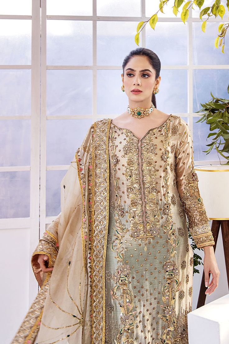 Long Kameez Trouser Embellished Pakistani Wedding Dress is a beautiful masterpiece that will give you a beautiful look on the big day. Luxury designs and hand-crafted details of ornaments make this beautiful Pakistani Embroidered Dress an epitome of beauty. Embellished Kameez: The beautiful kameez has an alluring golden color. The kameez is gracefully emblazoned with embroidery. Goldwork and intricate designs make this beautiful long kameez a perfect choice to wear on the wedding. Embellished bo Long Kameez, New Baby Dress, Pakistani Bridal Dress, Ugly Outfits, Pakistani Designer Clothes, Desi Wedding Dresses, Embellished Shirt, Pakistani Wedding Dress, Pakistani Fashion Party Wear