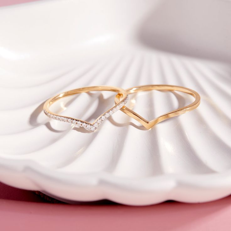 Add a touch of elegance with the Keller 14K Gold Ring. This 14k gold ring will add a charming accent to any outfit. Perfect for any occasion, this ring is a must-have for any jewelry collection. Available in 14K yellow gold Band width: 1mm SKU: BYR1137 Elegant Gold Couple Rings With Diamond Accents, Elegant White Gold Midi Rings For Formal Occasions, Dainty Gold Plated Diamond Ring For Anniversary, Elegant Gold Couple Rings With Diamonds, Elegant Gold Diamond Couple Rings, Elegant Stackable Crystal Promise Ring, Elegant Stackable Crystal Ring For Anniversary, Elegant Couple Rings With Diamond Accents For Gift, Elegant Gold Stackable Diamond Ring