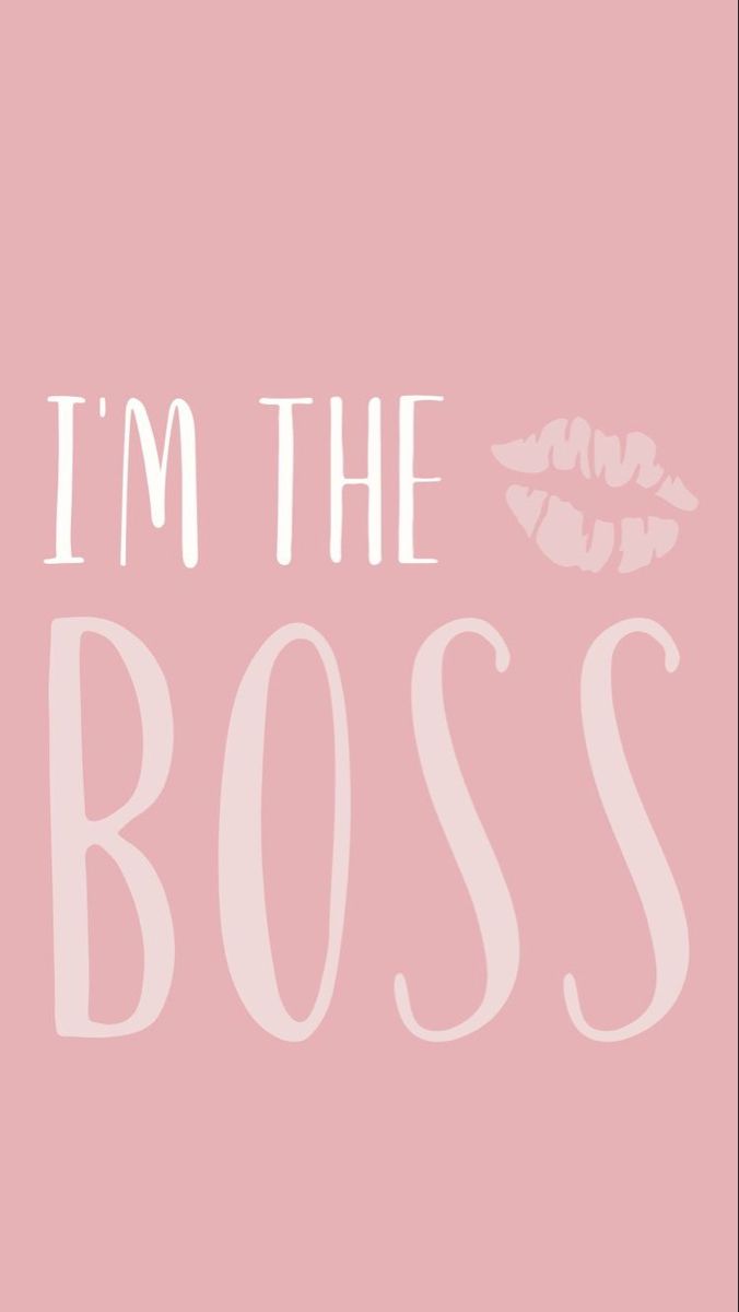 the words i'm the boss are in white letters on a light pink background