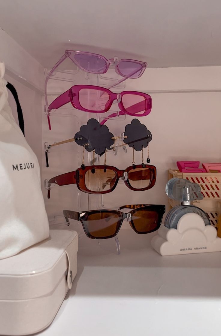 there are many pairs of sunglasses on display