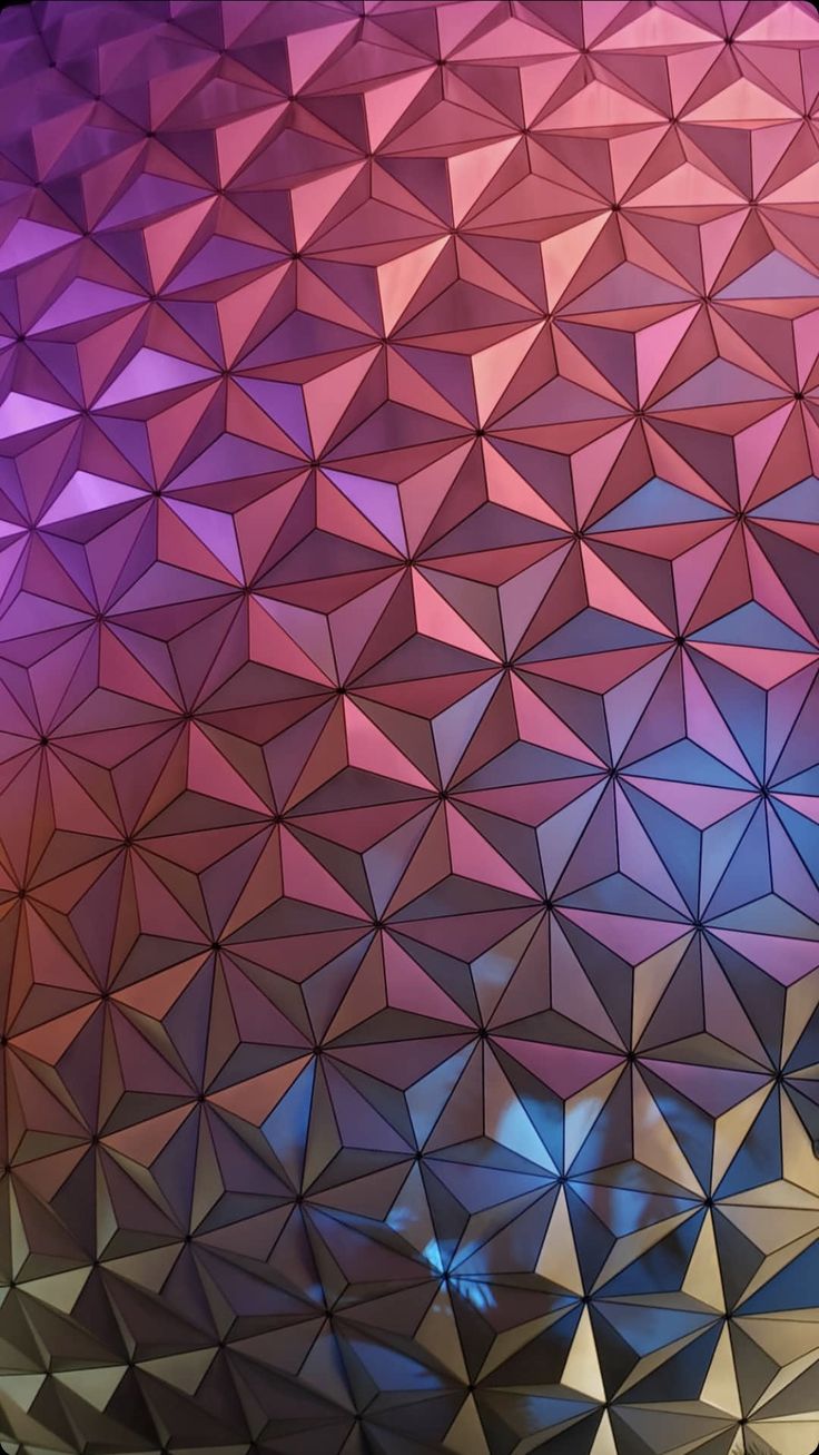 an abstract photo of the spaceship dome at disney world