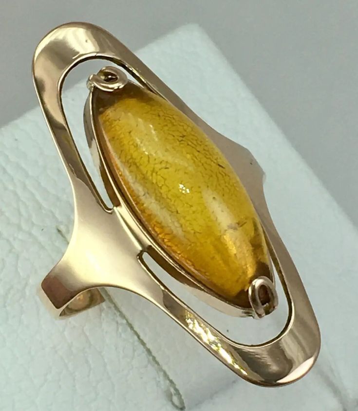 USSR Vintage Original Rose Gold Ring with Natural Baltic Amber 583 14K Riga 1978 | eBay Modernist Hallmarked Wedding Rings, Modernist Formal Cabochon Rings, Modernist Yellow Gold Wedding Jewelry, Modernist Yellow Gold Jewelry For Wedding, Modernist Hallmarked 14k Gold Jewelry, Modern Yellow Gold Collectible Rings, Modernist Oval Rings For Formal Events, Modernist Oval Rings For Formal Occasions, Formal Rose Gold Cabochon Ring