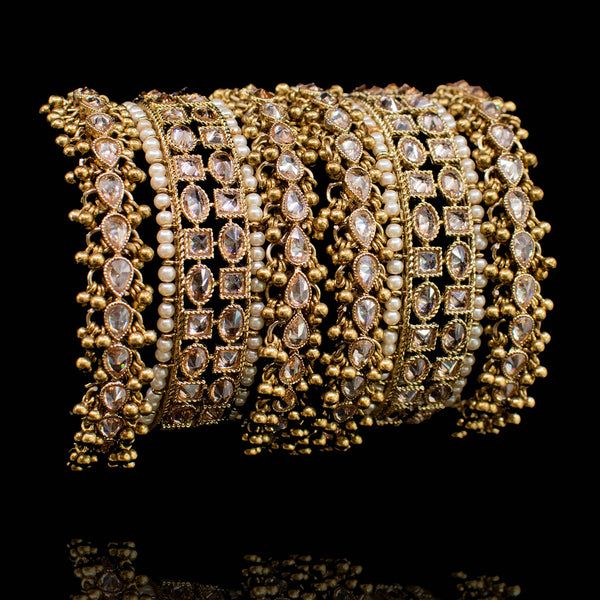 Haneem Bangles Indian Fashion Trends, Bridal Bangles, Diy Crafts Paper Flowers, Pakistani Jewelry, Gold Jewellery Design Necklaces, Fashionista Clothes, Faux Stone, Jewelry Design Necklace, Bangle Set