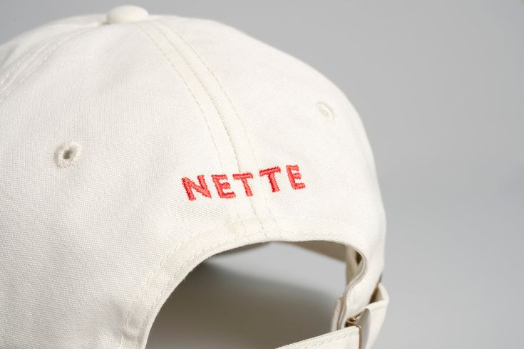 DESCRIPTION  Calling all FRAG HEADS! With a cream-on-cream colorway, embroidered declaration of fragrance fandom, and perfect dad hat fit, it’s easy to see why The Cap has been a summertime staple for us. It's crafted from lightweight 100% cotton for comfort and includes an adjustable fastener with a metal clasp and tonal under-peak lining for a perfect fit. DETAILS & CARE Low profile six panel cap, curved peak. Lightweight 100% cotton. Adjustable fastener with metal clasp. One size fits all. Beige Summer Hats With Embroidered Logo, Summer Cotton Snapback Hat With Curved Bill, Summer Cotton Snapback Hat With Curved Brim, White Dad Hat With Letter Print For Spring, Summer Cotton Baseball Cap With Letter Print, Summer Cotton Baseball Cap With Curved Bill, Beige Cotton Snapback Dad Hat, Summer Cotton Trucker Hat For Streetwear, Everyday White Cotton Trucker Hat