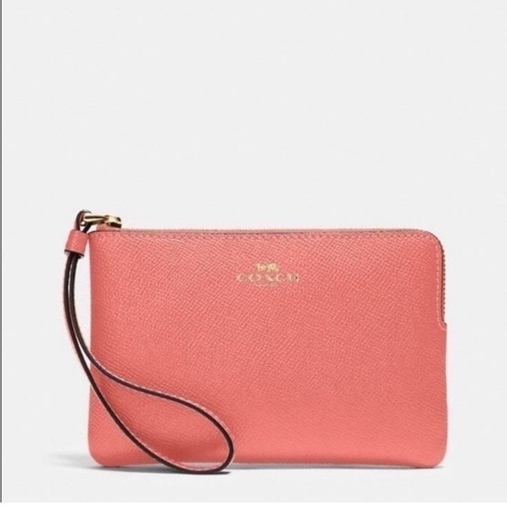 Coach Wristlet With Strap Never Used Trendy Wristlet With Zipper Pouch, Elegant Clutch With Wrist Strap, Elegant Everyday Wristlet, Trendy Coach Rectangular Clutch, Trendy Rectangular Coach Clutch, Classic Wristlet For Everyday Use, Classic Everyday Wristlet, Elegant Pink Wristlet With Zipper Pouch, Elegant Handheld Wristlet With Zipper Pouch