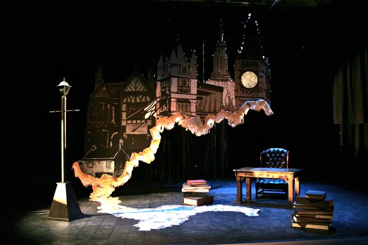 an image of a stage setting with furniture