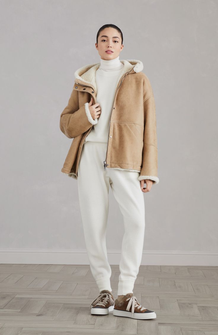 An iconic Brunello Cucinelli material, fine cashmere and silk yarn has been worked to highlight the qualities of both natural materials and make the garment soft, lightweight and an absolute delight to wear. High collar Regular shoulder Plain stitch Classic Cream Cashmere Outerwear, Chic Cashmere Outerwear With Ribbed Cuffs, Classic Beige Turtleneck Outerwear, Neutral Cashmere Long Sleeve Outerwear, Neutral Long Sleeve Cashmere Outerwear, Beige Cashmere Turtleneck Outerwear, Chic Cashmere Turtleneck Outerwear, Relaxed Fit Beige Cashmere Outerwear, Beige Cashmere Outerwear With Relaxed Fit