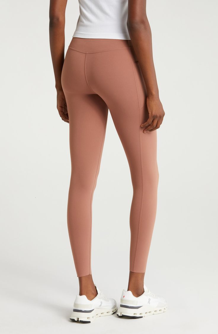 These performance leggings feature a high waist for smoothing coverage and two side patch pockets to keep your essentials secure through your activities. Pull-on style Front patch pockets UPF 50+ sun protection 80% nylon, 20% polyester Machine wash, line dry Imported Activewear With Side Pockets And 5-inch Inseam For Workout, Workout Activewear With Side Pockets And 5-inch Inseam, Compressive Leggings With Functional Pockets, Fitted Athleisure Activewear With Functional Pockets, Fitted Activewear With Functional Pockets For Yoga, Fitted Activewear For Yoga With Functional Pockets, Athleisure Yoga Leggings With Pockets, Fitted Yoga Activewear With Functional Pockets, Functional Pockets Yoga Pants For Gym