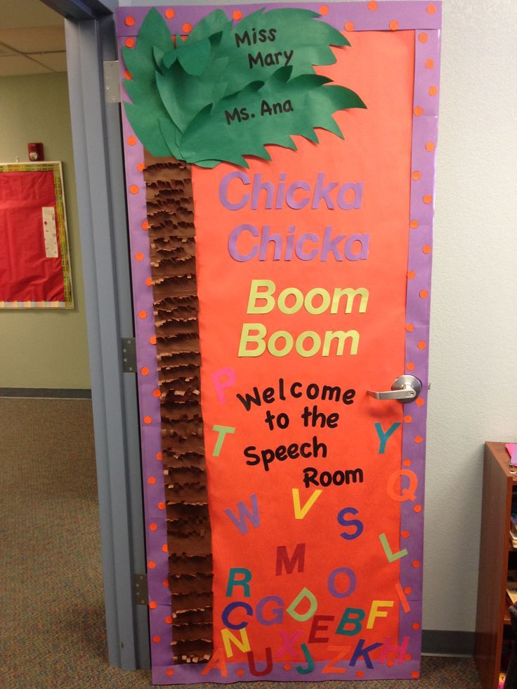 a door decorated like a palm tree with the words chicka chicka boom welcome to the speech room