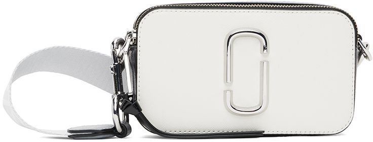 Saffiano leather shoulder bag in white, gray, and black. Logo hardware at face. · Detachable and adjustable shoulder strap · Logo embossed at top · Patch pocket at back face · Zip closure at two-compartment interior · Patch pocket at interior · Faille lining · Silver-tone hardware · H4.25 x W7.25 x D2.25 in Supplier color: Cotton multi Classic White Shoulder Bag With Logo Hardware, Chic White Shoulder Bag With Logo Hardware, White Shoulder Bag With Logo Hardware For Everyday Use, Modern White Shoulder Bag With Logo Hardware, White Crossbody Shoulder Bag With Logo Hardware, White Rectangular Shoulder Bag With Logo Hardware, White Travel Bag With Logo Hardware, Luxury White Shoulder Bag With Logo Strap, Modern White Shoulder Bag With Branded Hardware