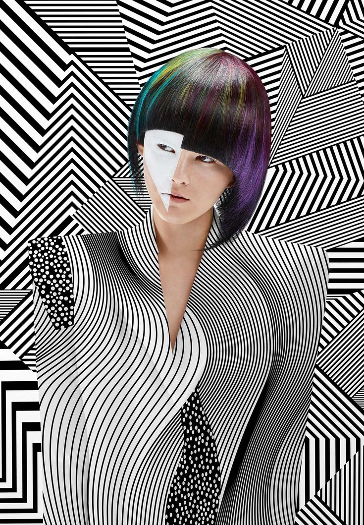 a woman with purple hair and black and white stripes on her face, standing in front of an abstract background