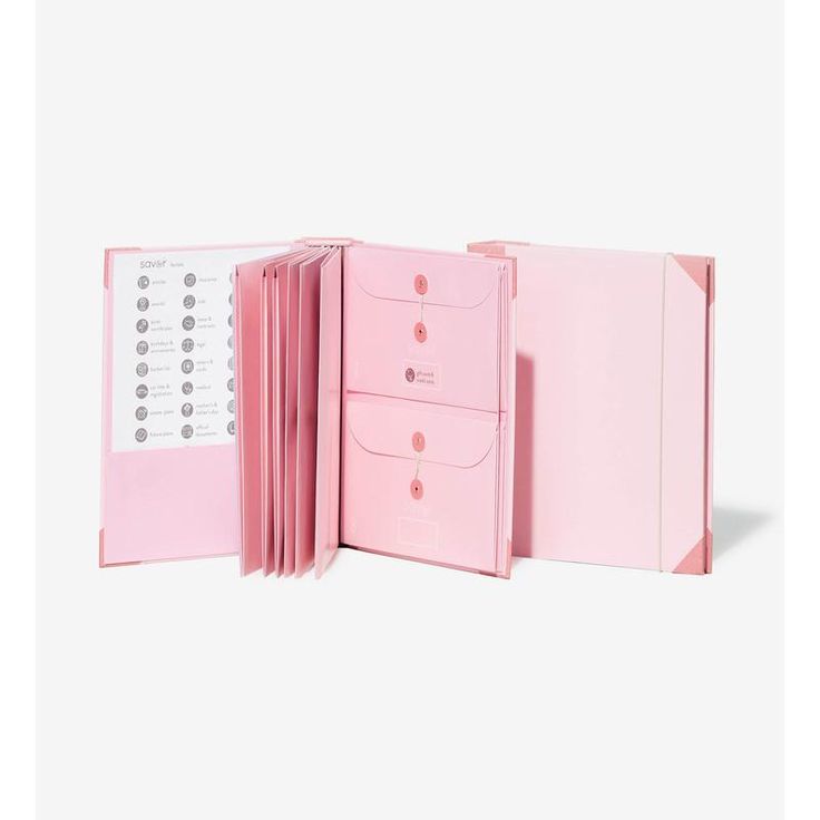 an open pink file folder with three drawers and two dividers on each side, in front of a white background