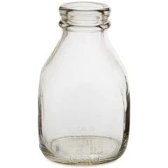 an empty glass bottle on a white background