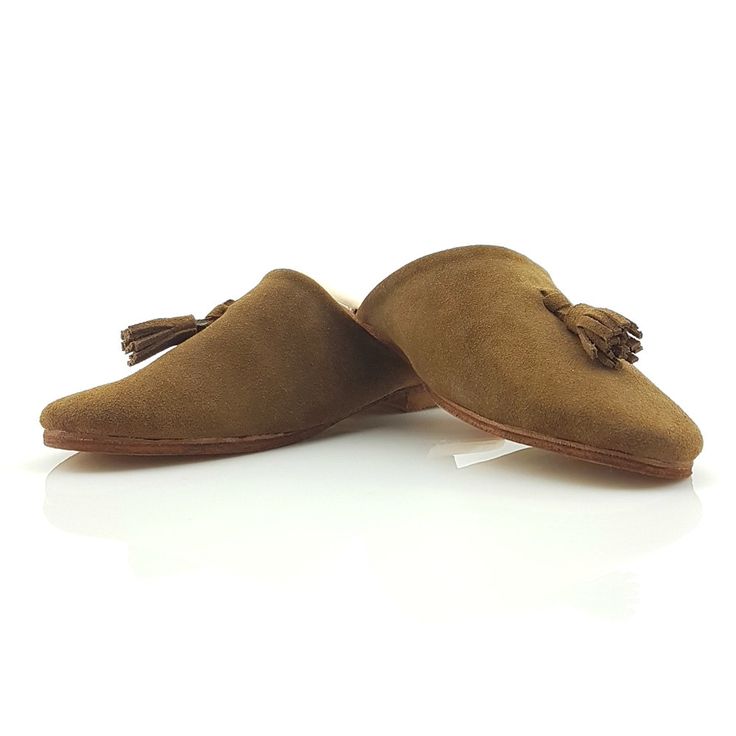 ♥♥ We ship Worldwide, please don't hesitate to contact us for a quote �♥♥ Dark Clay SlippersFur Camel Leather, Moroccan Slippers,handmade traditional Moroccan Slippers slide reimagined in recycled denim with a cozy shearling lining. Our repurposed denim is sourced locally in inland Morocco to reduce landfill waste. ♥We hope our Moroccan Slippers bring happiness and beauty into your hearts♥ This shoe has a thin leather lining, and we recommend occasional resoling or lining if planning to wear outs Moroccan Slippers, Leather Pouf Ottoman, Landfill Waste, Repurposed Denim, Moroccan Leather Pouf, Handmade Slippers, Moroccan Leather, Moroccan Pouf, Leather Pillow