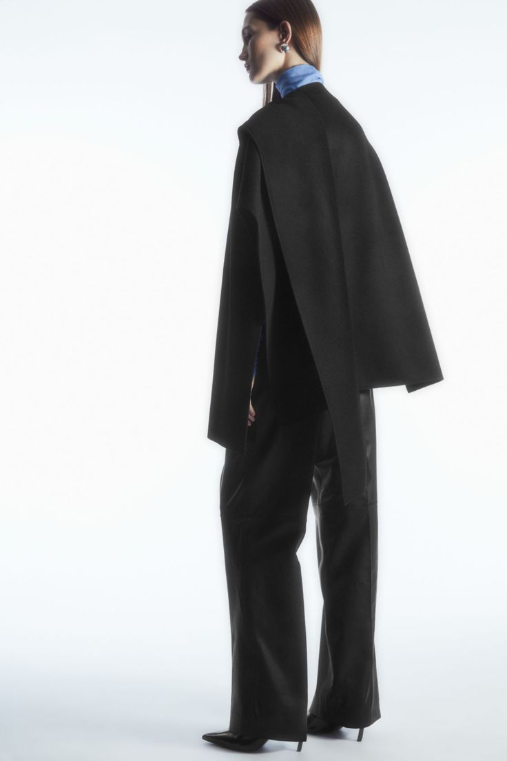 WOOL-BLEND CAPE - Black - Coats and Jackets - COS Elegant Wool Cape For Fall, Chic Cashmere Cape For Winter, Formal Wool Cape Outerwear, Wool Cape For Formal Occasions, Luxury Wool Cape For Winter, Luxury Wool Winter Cape, Elegant Cashmere Winter Cape, Elegant Fall Workwear Poncho, Elegant Fall Poncho For Workwear