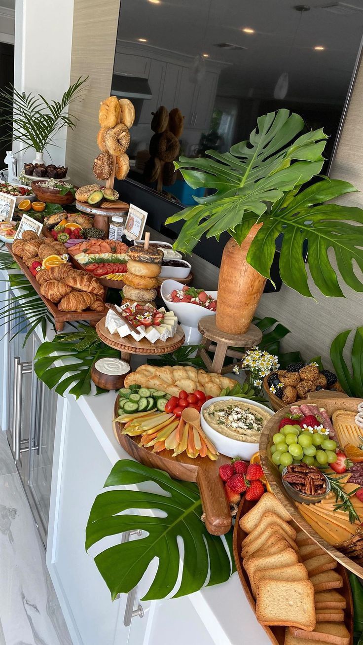 a buffet table filled with lots of food