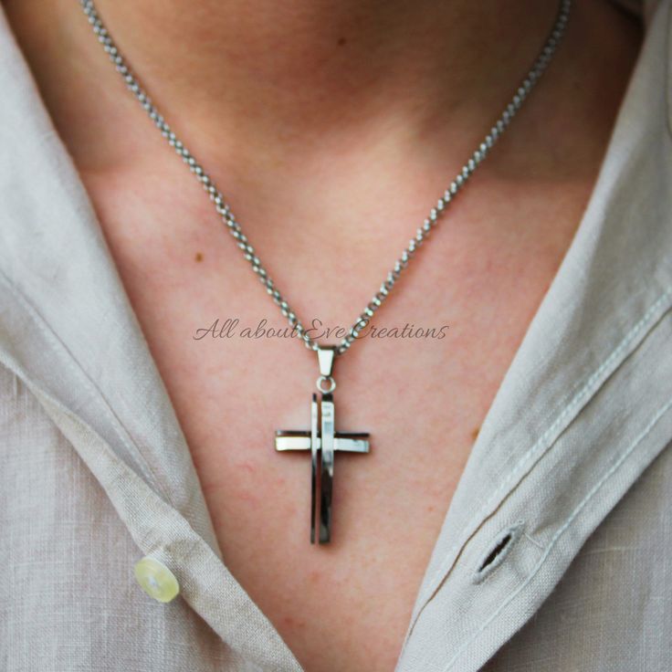 This beautiful cross pendant makes a great gift for yourself or your loved one. D E T A I L S *It features a  high quality stainless steel cross pendant. Pendant measures 36 x 20mm.  Available also in gold. *It hangs from a non tarnish stainless steel chain. *It closes with a large stainless steel lobster clasp. *Length: Choose the length you prefer from the drop down menu. Use the length chart as a reference. On the model you see the 26 inch option. S I Z I N G * H E L P : The smallest necklace Stainless Steel Crucifix Cross Necklace As Gift, Stainless Steel Cross Pendant Necklace For Gift, Gift Stainless Steel Cross Pendant Necklace, Stainless Steel Pendant Cross Necklace For Gift, Minimalist Stainless Steel Cross Pendant Necklace, Silver Stainless Steel Cross Necklace, Cross Necklace Mens, Mens Cross Necklace, Stainless Steel Cross Pendant