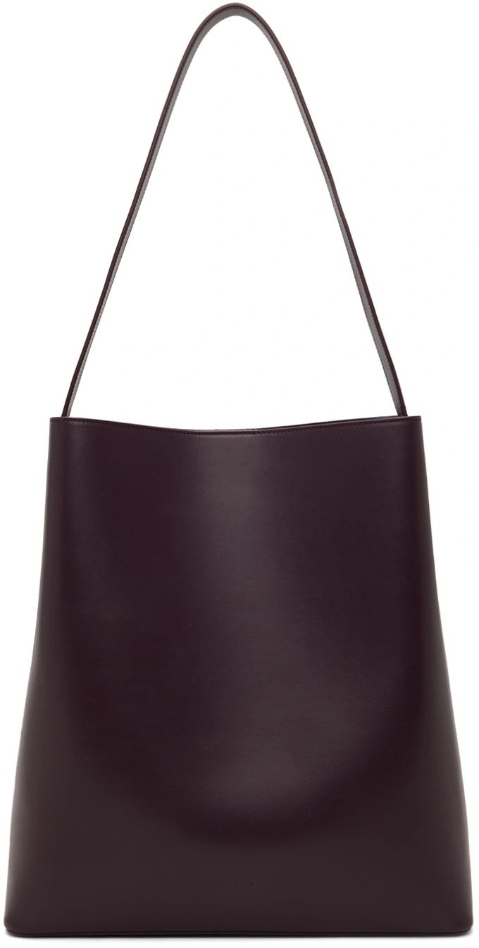 Aesther Ekme: Purple Sac Bucket Bag | SSENSE Modern Purple Shoulder Bag, Modern Purple Top Handle Shoulder Bag, Purple Leather Tote Shoulder Bag, Modern Purple Leather Shoulder Bag, Purple Office Crossbody Shoulder Bag, Modern Purple Shoulder Bag For Everyday Use, Purple Satchel Shoulder Bag For Office, Modern Purple Satchel For Daily Use, Purple Top Handle Shoulder Bag For Office