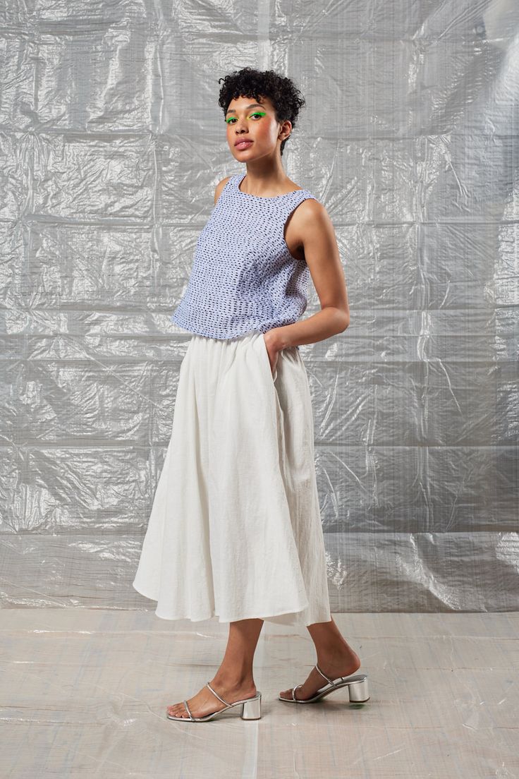 The Gathered Skirt is an easy-to-wear staple perfect for adding a little movement to your silhouette. It features a wide elastic waistband and a midi-length, perfect for wearing on top of shorts or activewear, or dressing up for a summer wedding. French Dart, Cream Skirt, Semi Cropped, Blue Sage, The Shift, Spring Summer 2022, Periwinkle Blue, Gathered Skirt, Toronto Canada