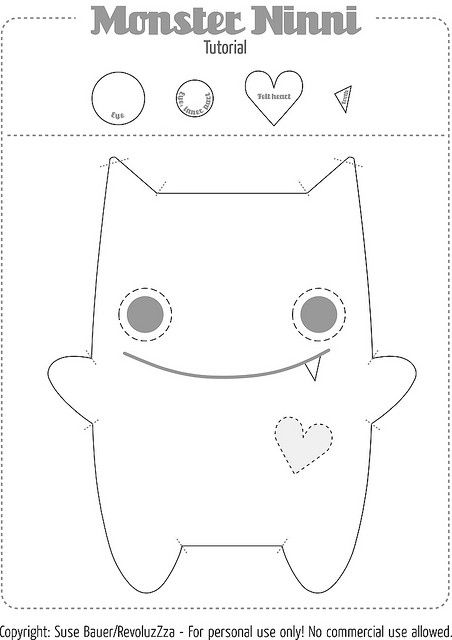 a paper cut out of a monster with hearts on it's chest and eyes