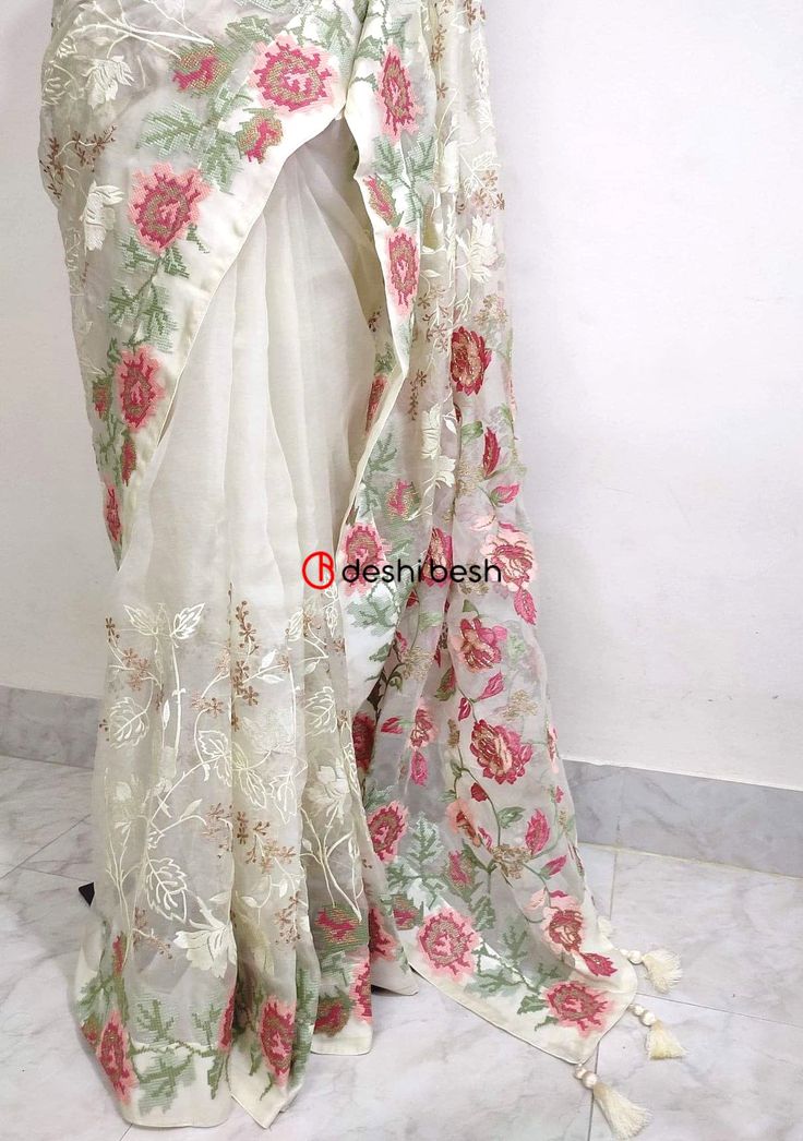 This exclusive boutique designer hand made Muslin saree is a perfect and unique choice for your occasional and party wear. All Over Delicate Neat Flower Embroidery, and Tassels Work. Matching Running Blouse Piece. Color: There might be slight color variation due to lightings and flashes while photo shooting. The color may also vary because of different screen resolutions. Wash Care: Dry Clean Only. Note: This is a hand made boutique saree and could take 1 to 2 weeks longer than the estimated dis Readymade Saree, Clothing Websites, Boutique Design, Dress 100, Beautiful Saree, Lehenga Choli, Sarees Online, Saree Blouse, Blouse Piece