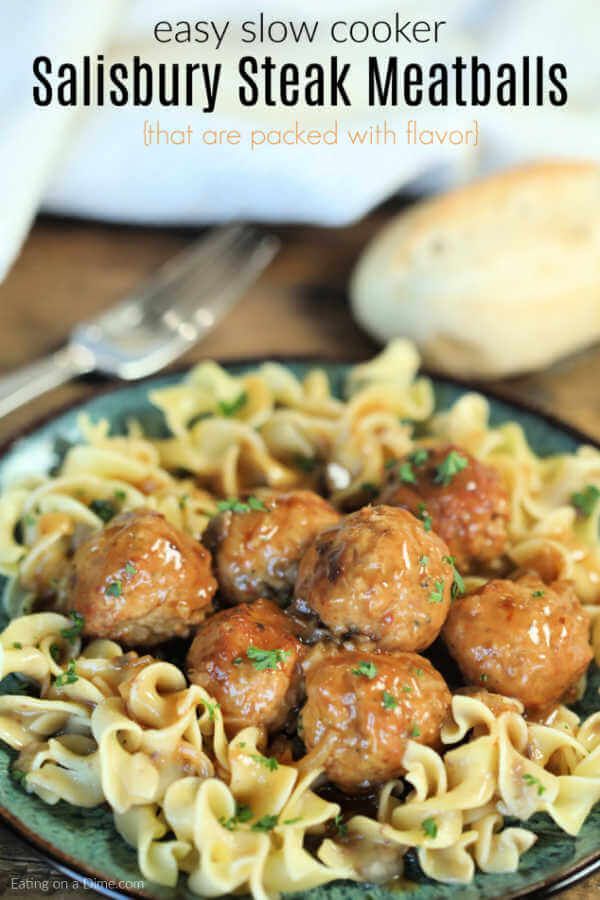 meatballs and noodles on a plate with text overlay that reads easy slow cooker salisbury steak meatballs