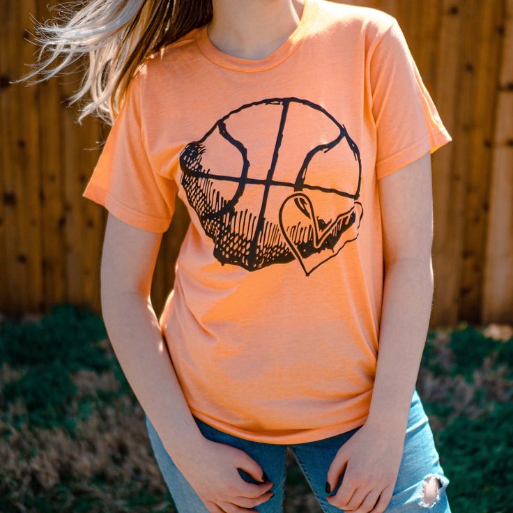 LOVE & BASKETBALL Tee - Sea Pine Designs Summer Streetwear T-shirt With School Spirit, Casual Basketball T-shirt With Screen Print, Casual Basketball T-shirt With Letter Print, Relaxed Fit Graphic Tee For Sports Season, Basketball Fan Apparel Tops With Short Sleeves, Relaxed Fit Fan Apparel T-shirt For Sports Season, Graphic Cotton Sports T-shirt, Sporty Cotton T-shirt With Comfortable Fit, Relaxed Fit T-shirt For Sports Fans