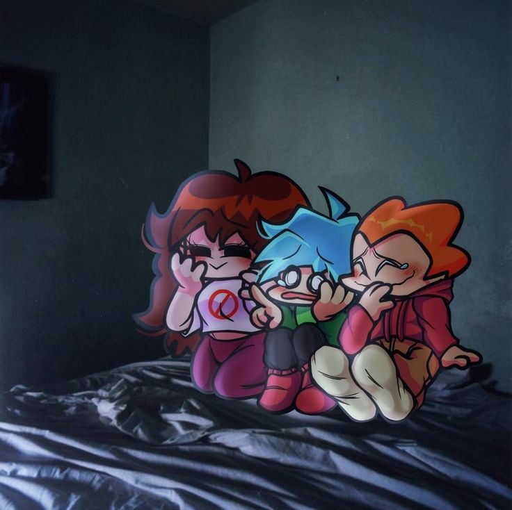 two cartoon characters sitting on top of a bed