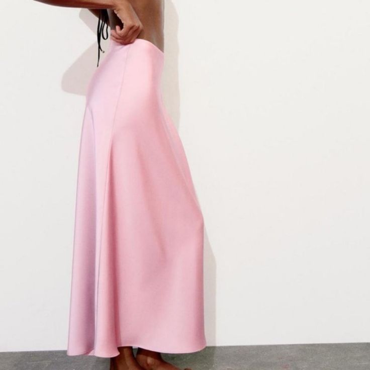 New With Tag Zara S/S 2024 Collection Midi Skirt Made Of Satin Effect Fabric. High Elastic Waist. Mid-Pink 5427/453 Outer Shell 97% Polyester 3% Elastane Clothing Care Guide: Machine Wash Max. 30c/86f Delicate Cycle Do Not Use Bleach / Whitener Iron Maximum 110c/230f Tetrachloroethylene Dry Clean Do Not Tumble Dry Feminine Wide Leg Maxi Skirt For Summer, Feminine Summer Evening Skirt, Feminine Pleated Skirt For Evening, Spring Evening Midi Maxi Skirt, Feminine Long Maxi Skirt For Evening, Fitted Pink Midi Dress, Feminine Evening Long Maxi Skirt, Zara Summer Flowy Maxi Skirt, Zara Flowy Summer Maxi Skirt