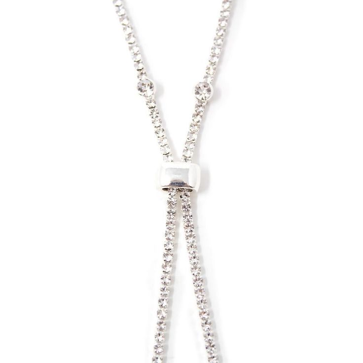 You will be ready for a fun evening out on the town with this seventeen- inch cubic zirconia lariat necklace. Silver Lariat Necklace With Adjustable Chain For Party, Adjustable Dangle Drop Necklace For Party, Backdrop Necklace With Long Drop And Adjustable Chain, Adjustable Silver Lariat Necklace With Long Drop, Adjustable Dangle Lariat Necklace For Party, Adjustable Long Drop Backdrop Necklace, Party Silver Lariat Necklace With Cubic Zirconia, Crystal Lariat Necklace For Formal Occasions, Silver Lariat Drop Necklace For Party