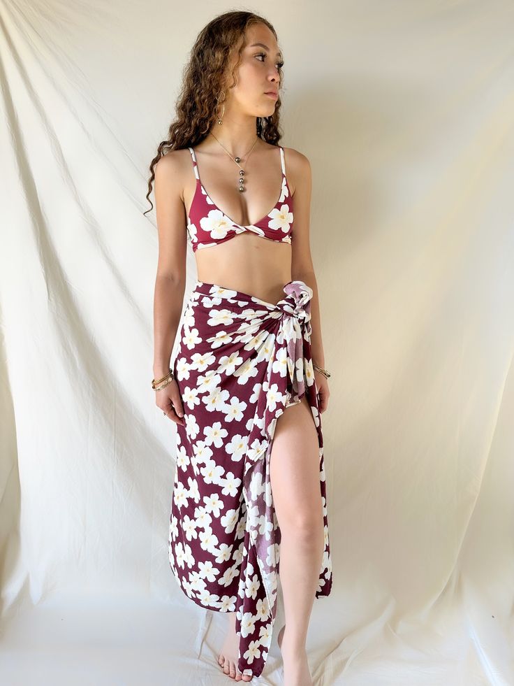 Crafted from a recycled ECO-RAYON fabric, this luxe wrap sarong is a sustainable choice that looks and feels luxurious. A lightweight fabric drapes elegantly, adding a stylish touch to your beach wardrobe. This versatile wrap can be worn short or long in many different ways, and is perfect for making a statement on a hot summer day. STYLE TIP: Wear long or short, as a dress or beach towel. Folds in multiple ways, find us on social for all the hacks! Exclusively Hanakini Prints Material: Rayon an Towel Folds, Beach Wardrobe, Draped Fabric, Rayon Fabric, North Shore, Sarong, Summer Day, Hot Summer, Lightweight Fabric