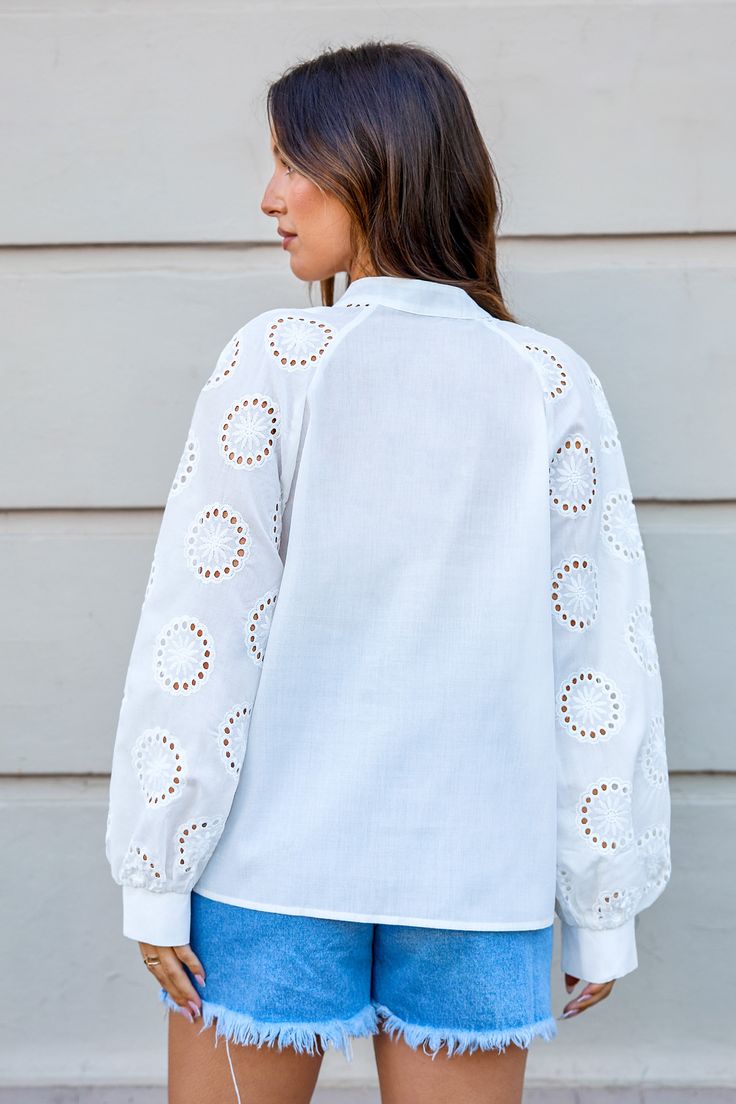 The White Button-Up Eyelet Puff Sleeve Blouse delivers with charming eyelet details and statement puff sleeves. It’s your new go-to for adding a touch of whimsy to any outfit—perfect for turning ordinary into extraordinary! Product code: CAA04B4G021CC Features:  Woven Standing collar with V-neck Eyelet puff sleeves Front buttons Pattern: Faux Texture Wash Method: Regular Wash Material: 100%POLYESTER. Spring Bishop Sleeve Blouse With Button Cuffs, Spring Bishop Sleeve Blouse With Button Closure, Spring Blouse With Bishop Sleeves And Button Closure, Spring Bishop Sleeve Tops With Button Closure, Spring Tops With Bishop Sleeves And Button Closure, Bishop Sleeve Tops With Buttons For Summer, Spring Button-up Puff Sleeve Top, Cotton Eyelet Puff Sleeve Tops, Daywear Eyelet Button-up Top