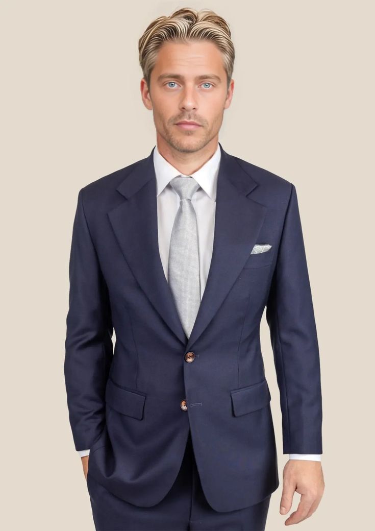 Indulge in luxury with the Stratos Blue Sharkskin Suit, crafted with custom-made precision from Super 110s wool mohair blend by Vitale Barberis Canonico, Italy. A classic staple of any fashionable wardrobe, this sharp suit exudes elegance. Elevate your style with this premium piece that will make you stand out in any setting. Luxury Fitted Sport Coat For Business, Luxury Fitted Business Sport Coat, Luxury Suits With Welt Pockets, Luxury Single-breasted Suits For Semi-formal Occasions, Luxury Single Breasted Fitted Suits, Fitted Single Button Silk Suit, Luxury Fitted Single Breasted Suits, Elegant Silk Suits For The Office, Elegant Silk Suit For Office