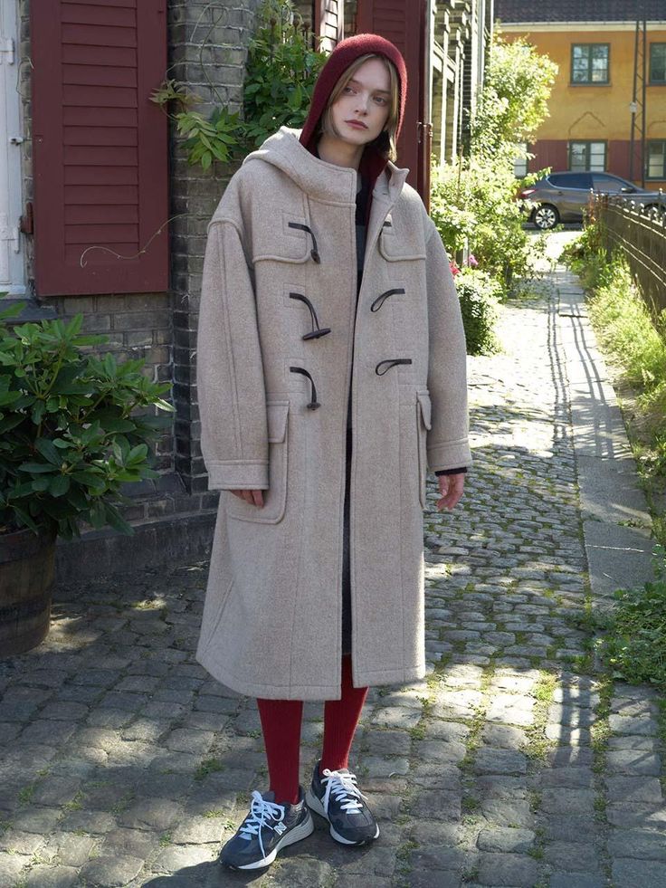 This coat is a modern interpretation of the classic duffel coat design, featuring a relaxed silhouette and long length. It is made of a wool blend fabric.- Long length that makes your outfit stylish- Real leather strings and toggle buttons for a high level of completion- Check pattern lining with wool touch for added warmth and style* The actual color of the product is the most similar to the product cut. Wool Coat With Hood, Duffel Coat Outfit, Duffle Coat Outfit, Duffle Coat Women, Duffel Coat, Duffle Coat, Grey Coat, Hijabi Outfits, Current Styles