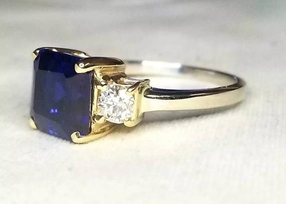 VINTAGE 14k white & gold DIAMOND AND SAPPHIRE RINGCENTER DIFFUSED BLUE SAPPHIRE IN RADIANT CUT WEIGHT 3.65CTSIZE 8.2X8.2mmGORGEOUS BLUE SAPPHIRE AAA RATED!!CLEAN ,VERY NICE CUT ,AMAZING BRILLIANCE FULL OF FIRE,side natural old mine cut natural diamonds 0.40ct. Si1 quality G- COLORRING size 6.5Retail value $6,500 net .Appraisal available Gia Certified Square Cut Sapphire Ring, Elegant Gia Certified Square Cut Sapphire Ring, Formal Square Cut Sapphire Ring With Accent Stones, Gia Certified Square Cut Sapphire Ring For Formal Occasions, Rectangular Sapphire Ring With Accent Stones For Formal Occasions, Rectangular Sapphire Ring With Prong Setting, Formal Rectangular Sapphire Ring With Accent Stones, Formal Sapphire Square Cut Rings, Fine Jewelry White Gold Square Cut Sapphire Ring