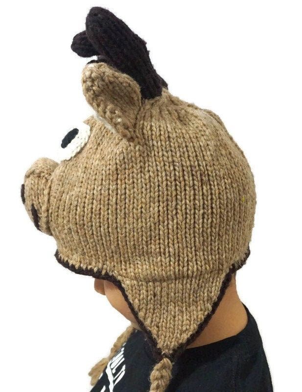 This beanie hat is one size. The hat stretches and it fits from 3 year old child up to adult. It is made of wool and it has white fleece linen inside.Measurements:Head circumference: 20" to 24"Hat Length: 7" to 8" Ear flaps Length: 6"Care Instructions:Gently Hand washDo not wringLay flat to dryDo not Tumble dry Connect with us on Instagram and Facebook: @latinamericanboutique Moose Hat, Fleece Beanie, Hat For Kids, White Fleece, Wool Winter, Knit Beanie Hat, Kids Hats, Head Circumference, Beanie Hat