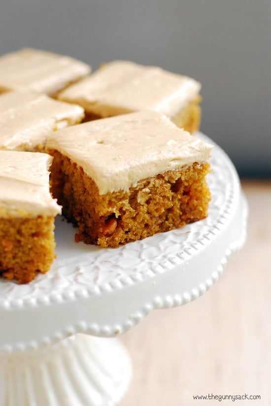 pumpkin butterscotch bars on a white cake plate