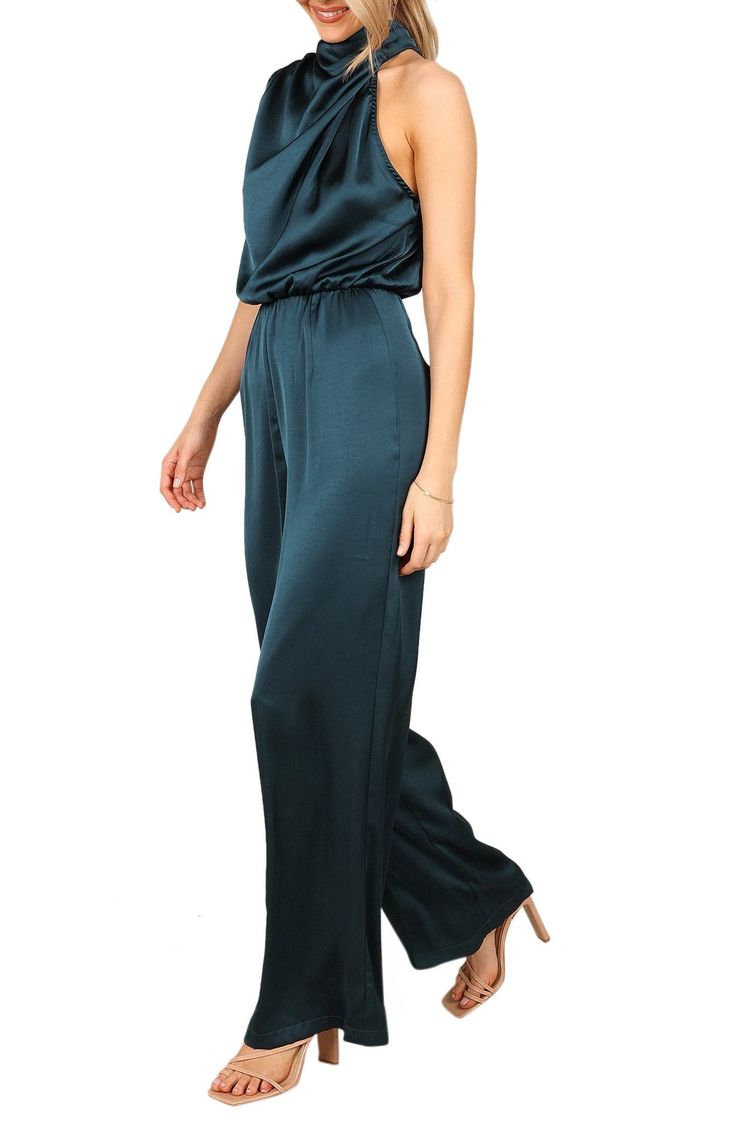 This glamorous satin jumpsuit is designed with soft bodice pleats and a sleek cutaway shoulder. Back keyhole with button-and-loop closure Mock neck Sleeveless Unlined 95% polyester, 5% elastane Hand wash, dry flat Imported Chic Fitted Satin Jumpsuits And Rompers, Spring Evening Satin Jumpsuits And Rompers, Elegant One-shoulder Jumpsuits And Rompers For Date Night, Chic Satin Jumpsuits And Rompers For Evening, Sleeveless Satin Jumpsuits For Evening, Elegant One-shoulder Jumpsuits For Date Night, Elegant Fitted Satin Strapless Jumpsuit, Chic Formal Satin Jumpsuits And Rompers, Satin Jumpsuits And Rompers For Night Out In Spring